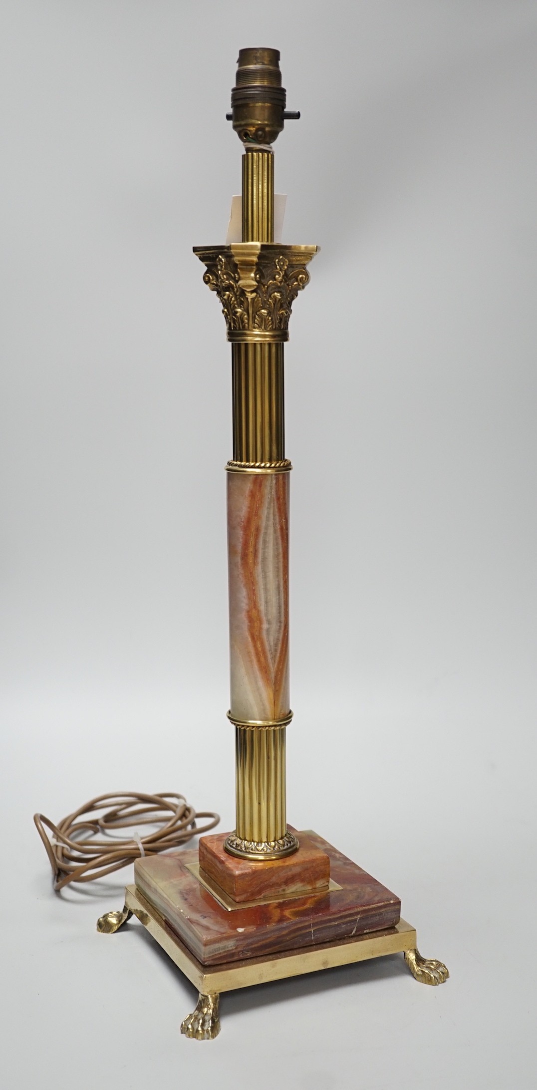 A brass and onyx Corinthian column table lamp, 55cm total height